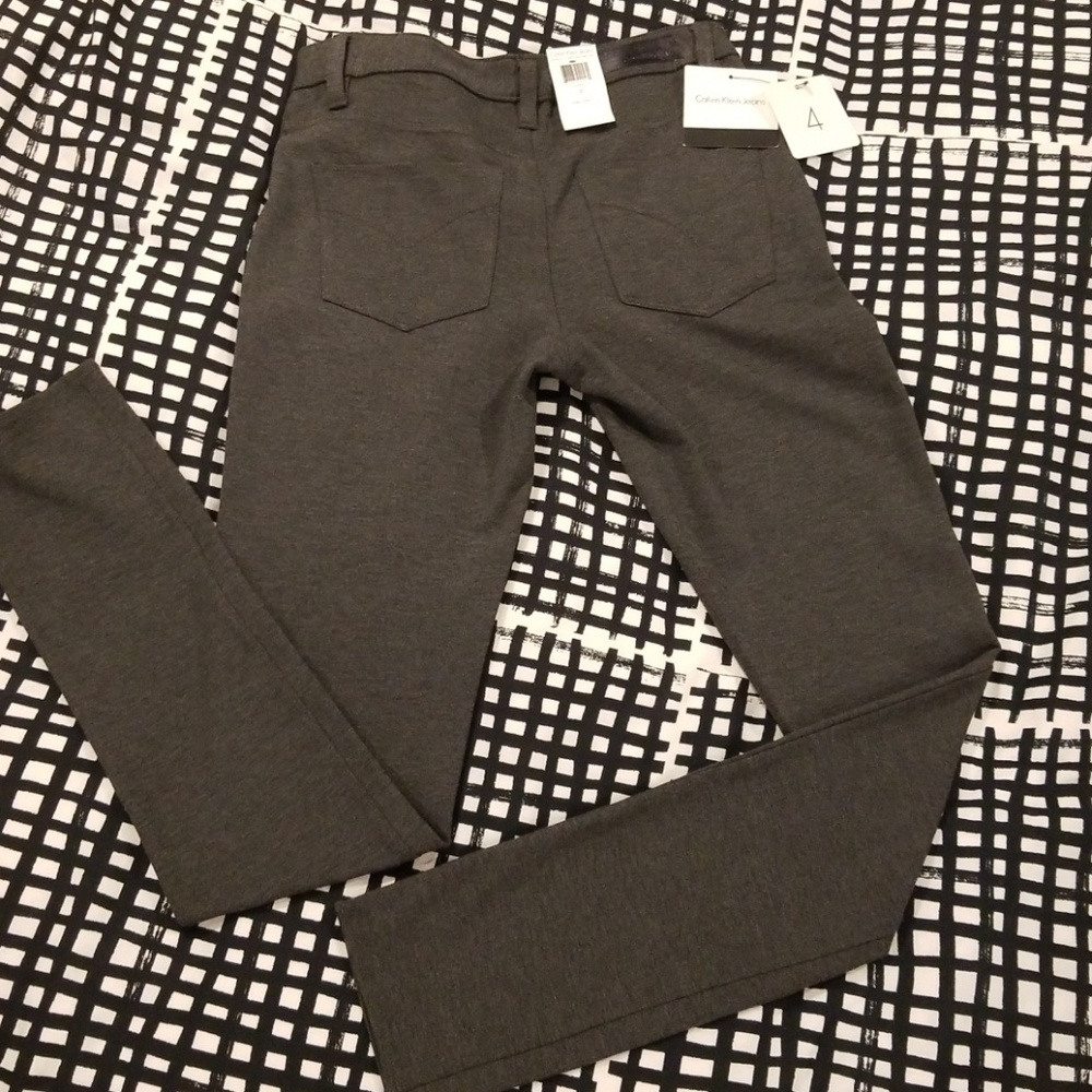 Dark grey pants.